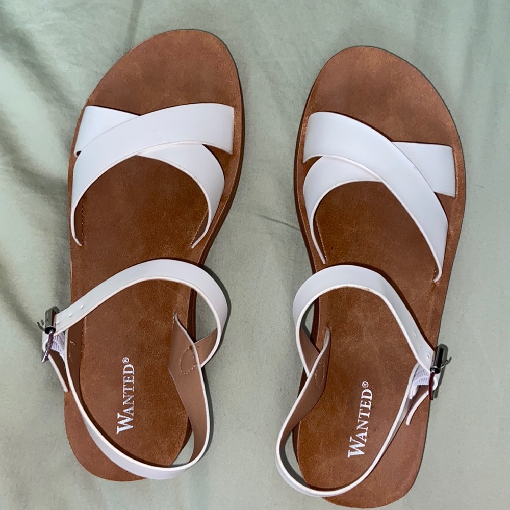 Cute white strappy sandals by Wanted